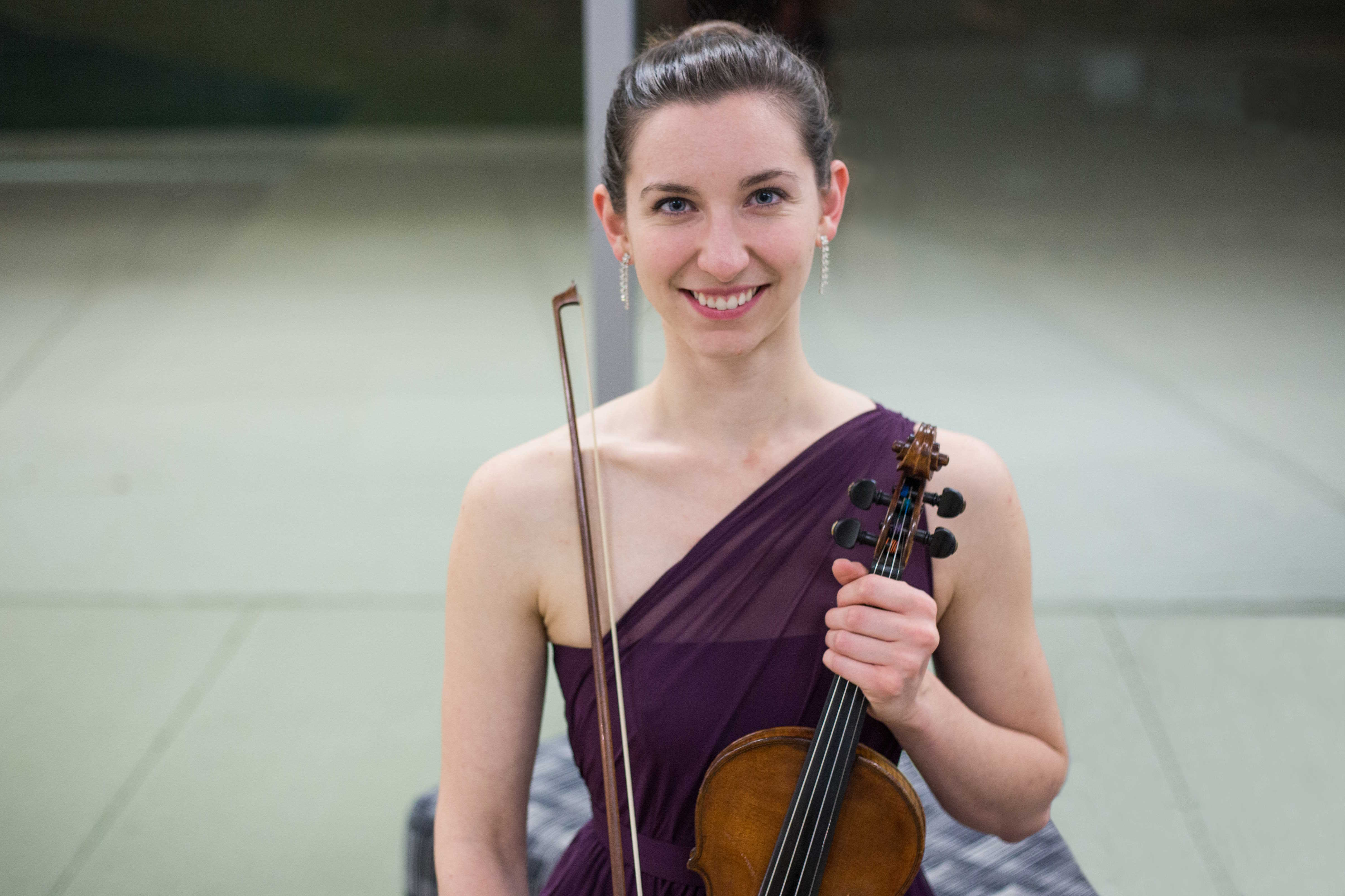 Picture of Brandi Main holding her violin
